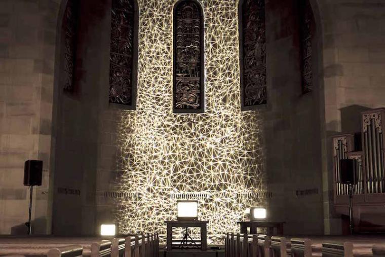 Photo of a light projection on a chapel wall