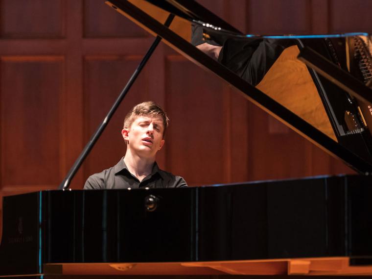 man performing at the piano.