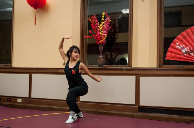 A dance performer poses.