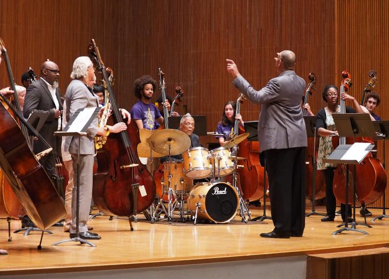 Jazz ensemble including several double basses