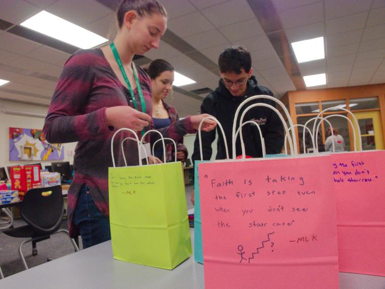 Ninde Scholars assemble gift bags for high school teachers and to spruce up elementary classrooms