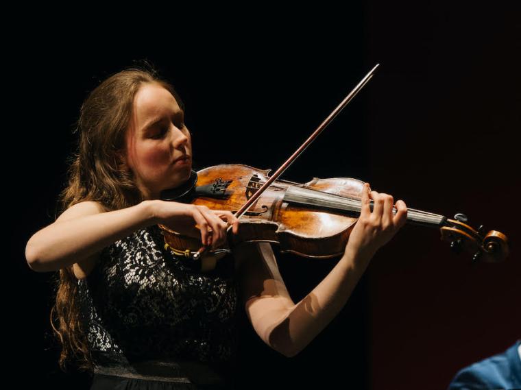 female violist performing