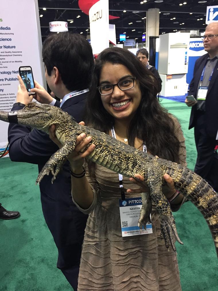 Naviya Schuster-Little with an alligator