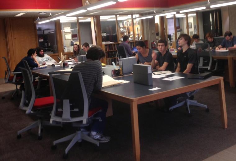 Students search primary documents in the Oberlin College Archives