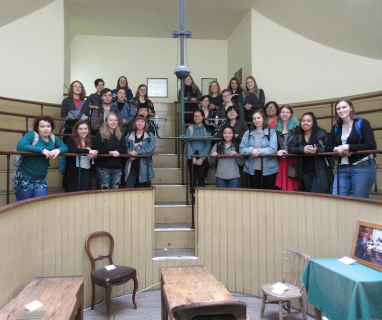 group poses during a visit to the Old Operating Theater and Herb Garret in London