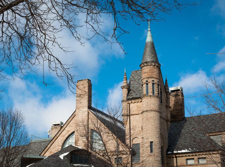 Exterior of 1880s Sandstone Building with tower and steeple