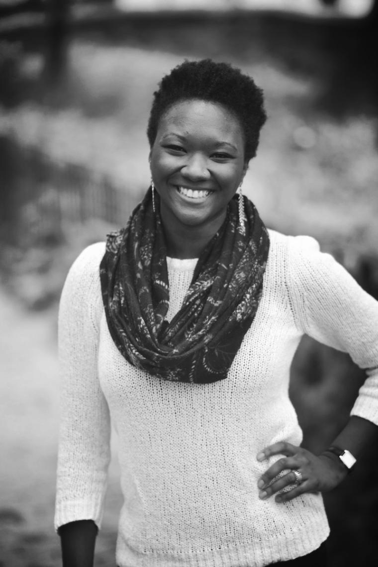 A woman standing with her hand on her hip