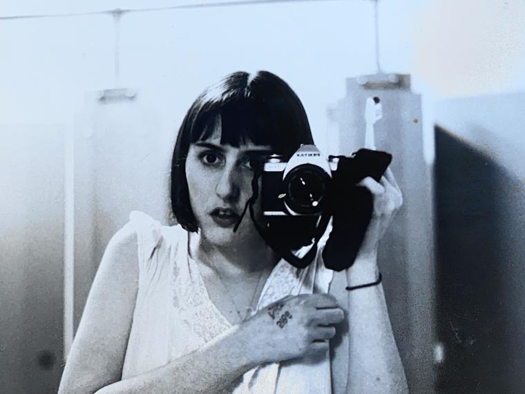 Ry Russo-Young takes a self-portrait in the a mirror