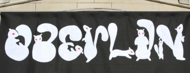 Banner of "Oberlin" spelled in the shapes of squirrels 