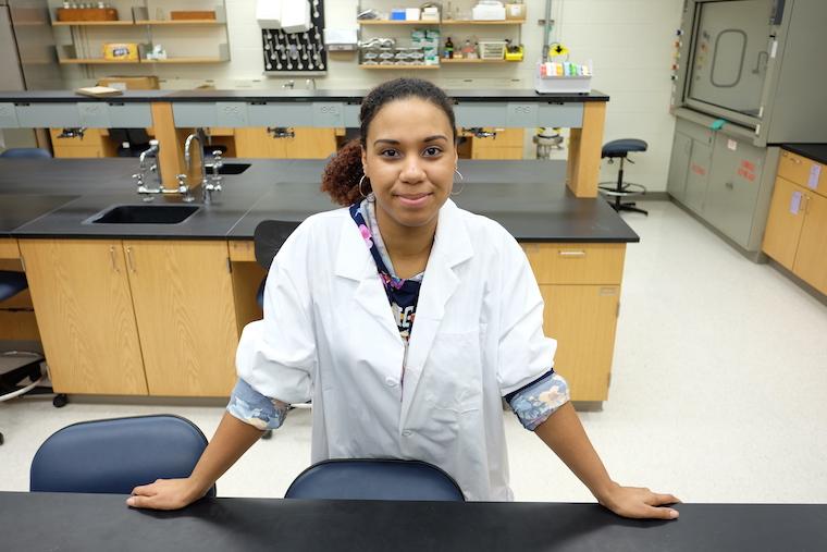 Kaitlyn Rivers standing in her biology lab.