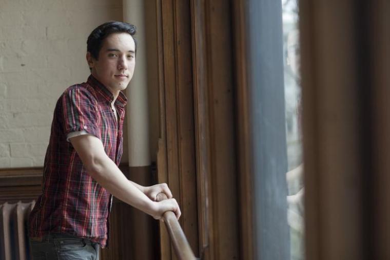 Taiyo Scanlon-Kimura standing by a window