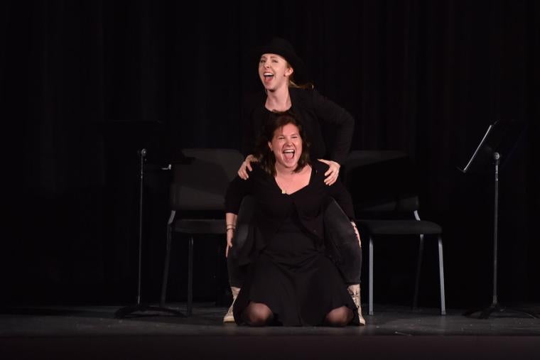 Two performers on stage