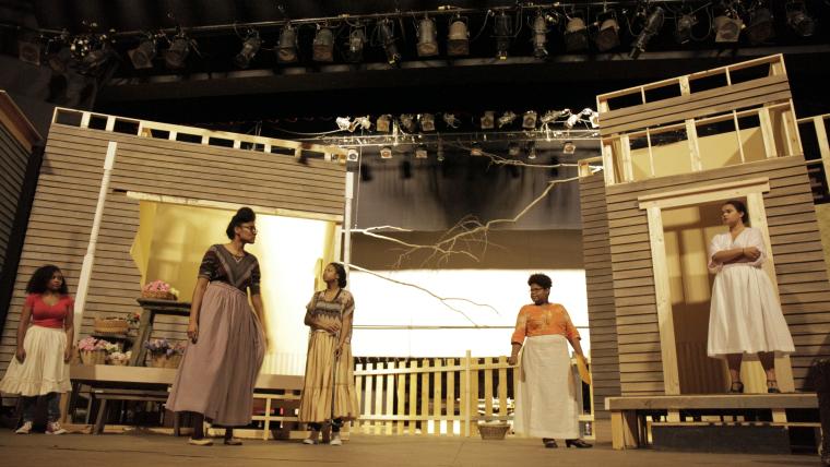 people acting on a stage