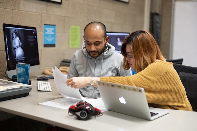 two associates at the writing center