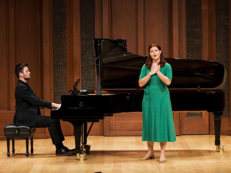 Kylie Kreucher performs with a pianist