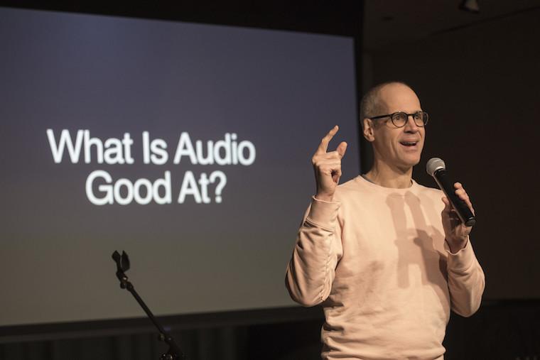 Man talking into microphone.