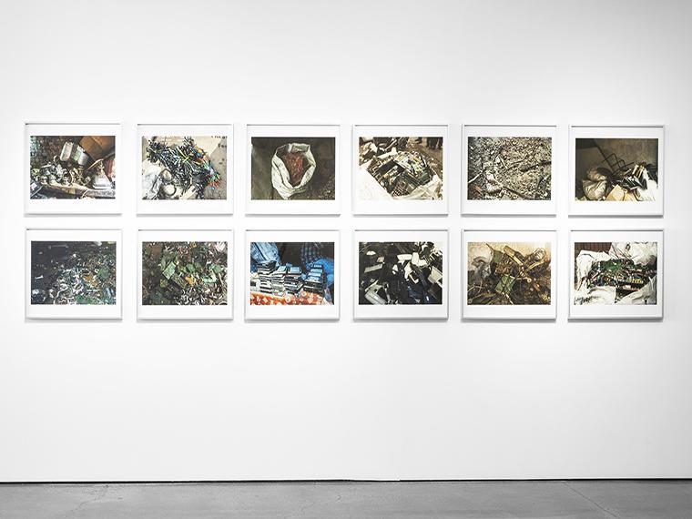 A gallery wall of photographs.