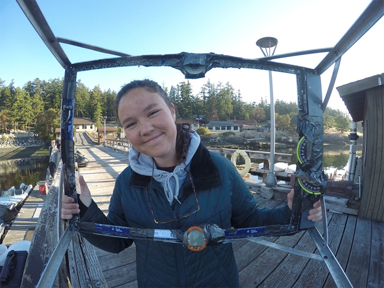 Woman smiling on a boat.