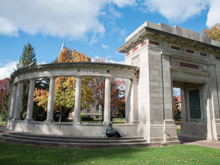 Memorial arch in Tappan Square with a blue sky in background.