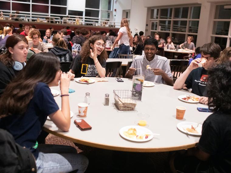 Students sitting at a table in Stevenson Dining Hall.