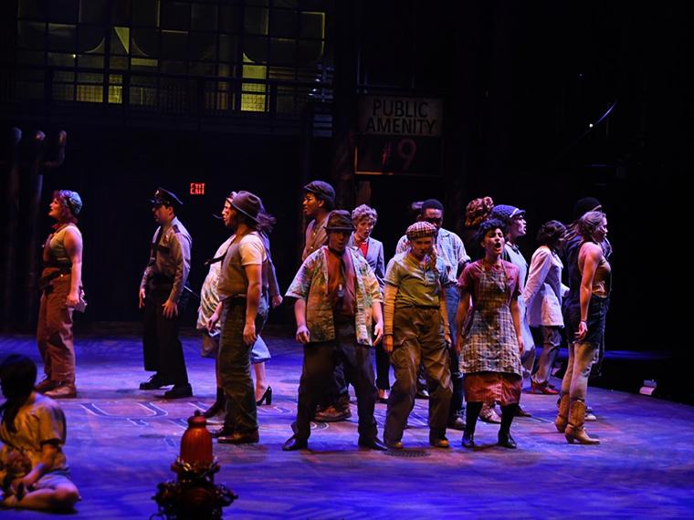 The company of Urinetown: The Musical, by Greg Kotis, Music by Mark Hollmann, Lyrics by Mark Hollmann and Greg Kotis, Directed by Matt Wright, Dec 5-8, 2019