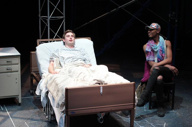 Evan Board as Prior Walter, Seyquan Mack as Belize in Angels in America Part One: Millennium Approaches, by Tony Kushner, Directed by Matthew Wright, Hall Auditorium, Apr 12-21, 2018