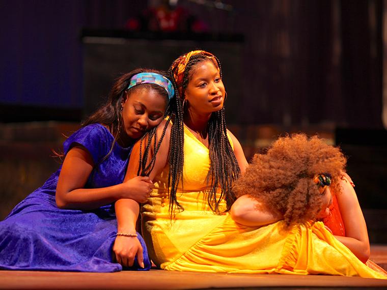 Victoria Ellington as Lady in Blue, Deja Alexander as Lady in Yellow, Kiela Nelson as Lady in Orange in for colored girls who have considered suicide / when the rainbow is enuf, written by Ntozake Shange, Directed by Caroline Jackson Smith, Hall Auditorium, Apr 13-16, 2017