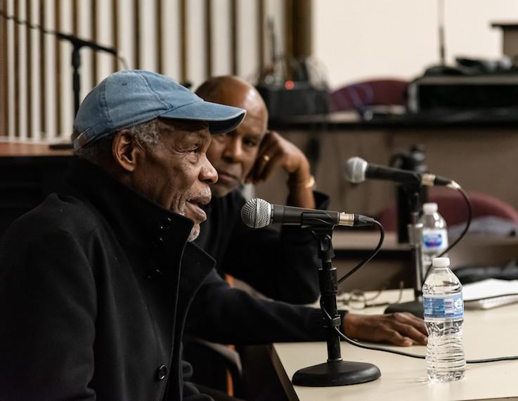 Actor Danny Glover talks to an audience.
