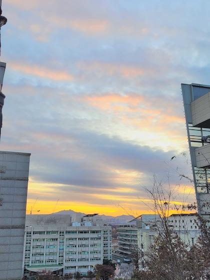 Hanyang University in winter at sunset with subtle blue and pink clouds across the sky.